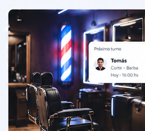 Interior moderno de una barbería con iluminación azul y roja